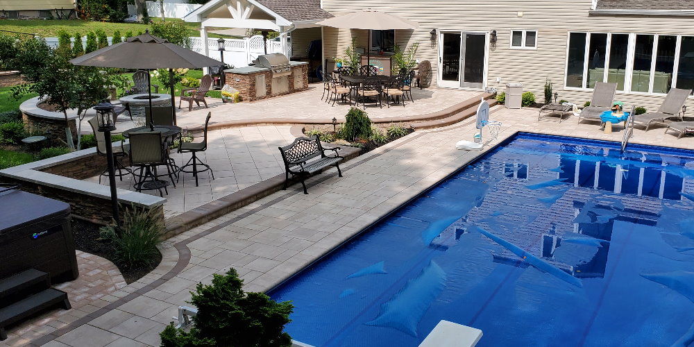 pool patio with cambridge xl smooth pavers sandstone lite
